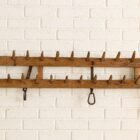 d0b5aa69 2158 4dd0 ac9e 60b3fbcdf1ee Vintage Elmwood Wall Rack – Handmade, 70–72”L